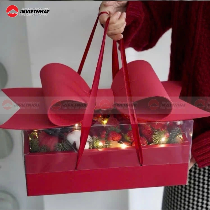 Hộp giấy đựng dâu tây có gắn nơ
