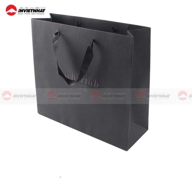 23+ Mẫu in túi giấy cho shop thời trang GIÁ RẺ, chất lượng, giao nhanh tại TPHCM 38 Túi giấy ruy băng thời trang
