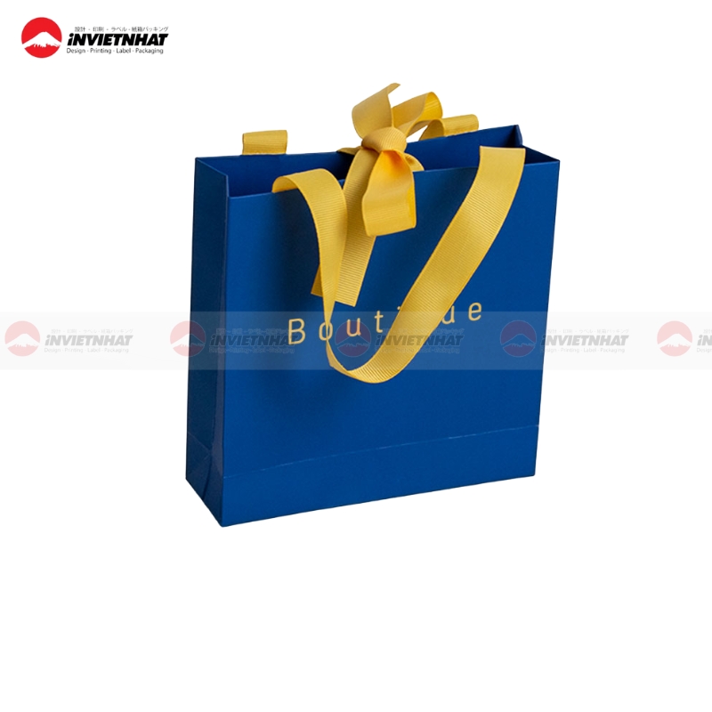 Túi giấy ruy băng vàng