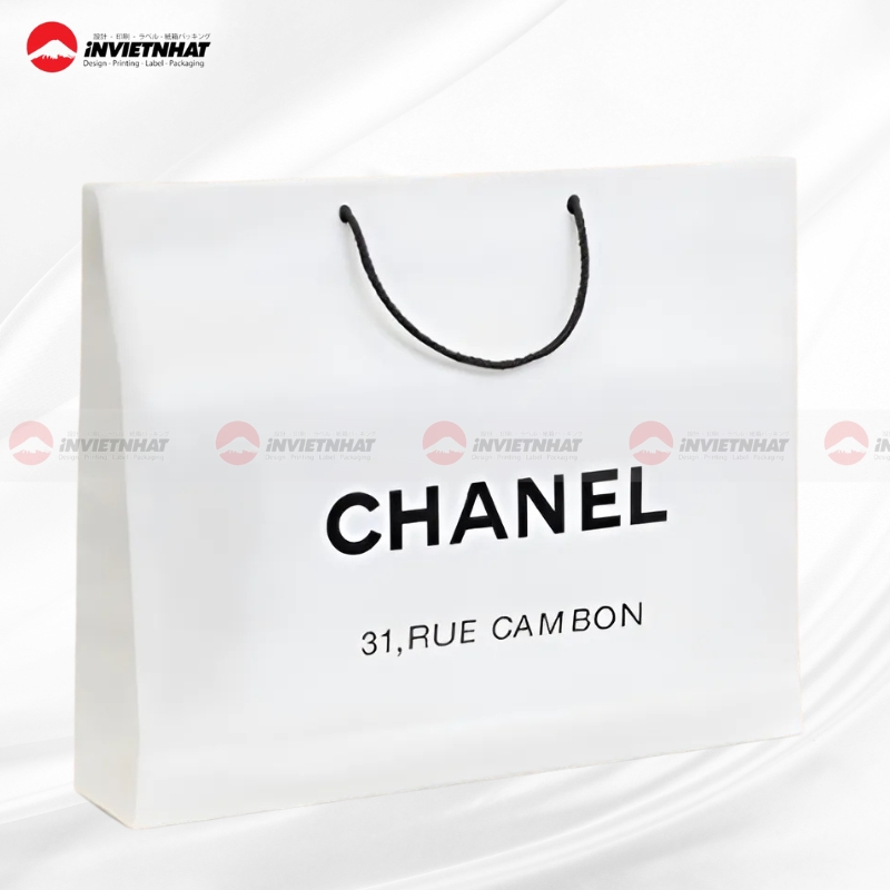 tui giay Chanel mau den