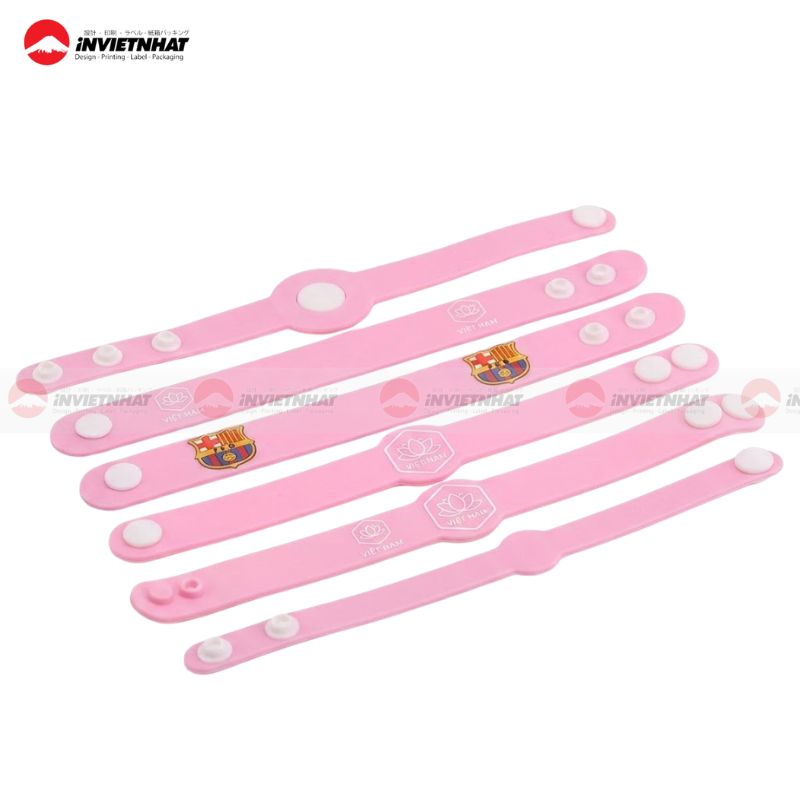 vòng tay cao su cúc bấm điều chỉnh size màu hồng