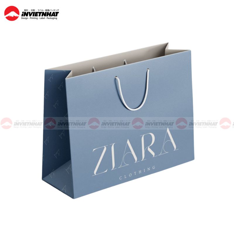 In túi giấy couche 11 túi giấy couche màu xanh dương